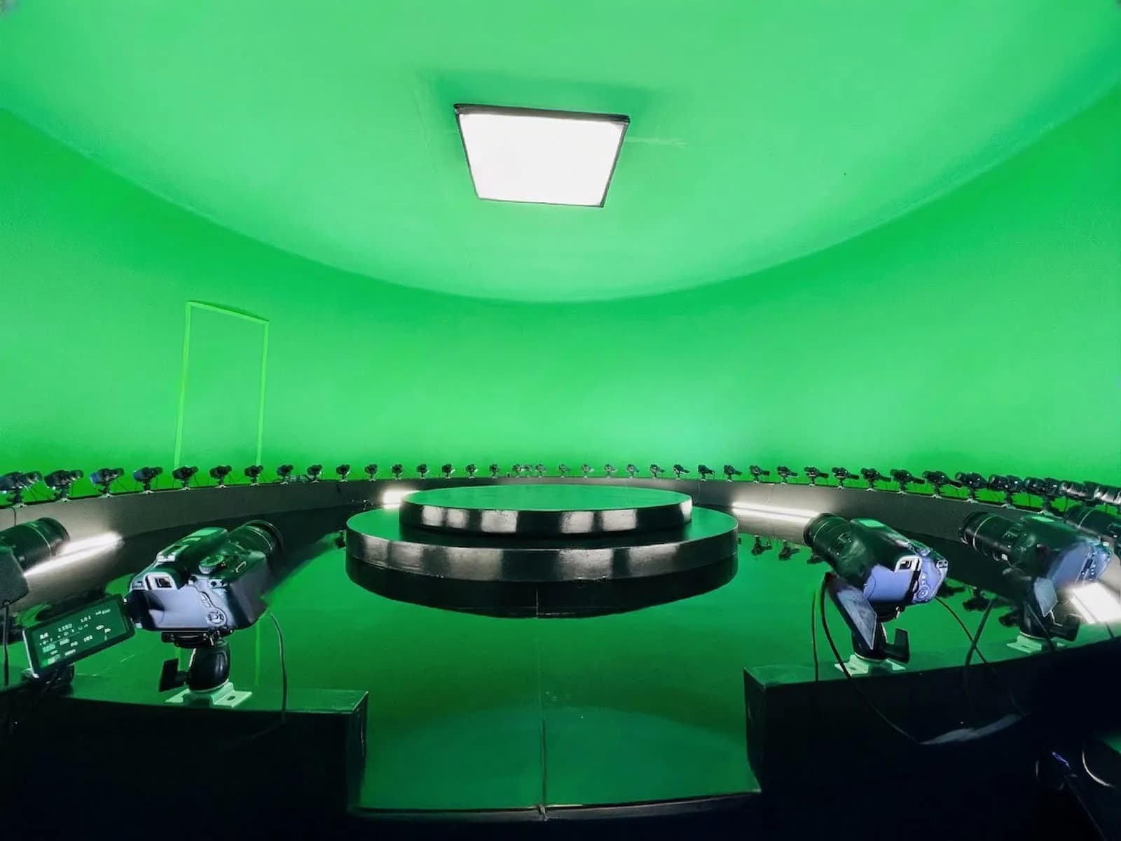 Wide view of the green-screen studio