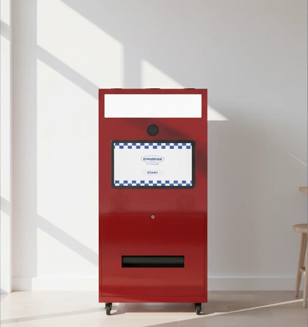 Red Portable photo booth inside a wedding venue