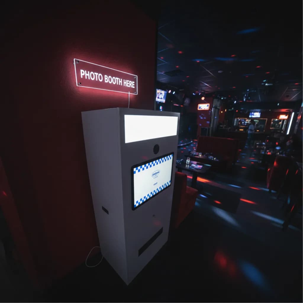 Portable photo booth inside a bar