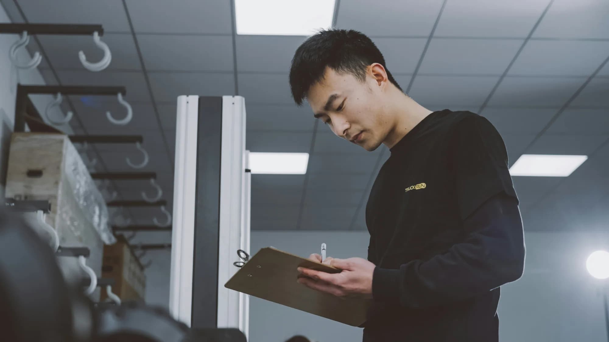 Site inspection by a technician with a clipboard