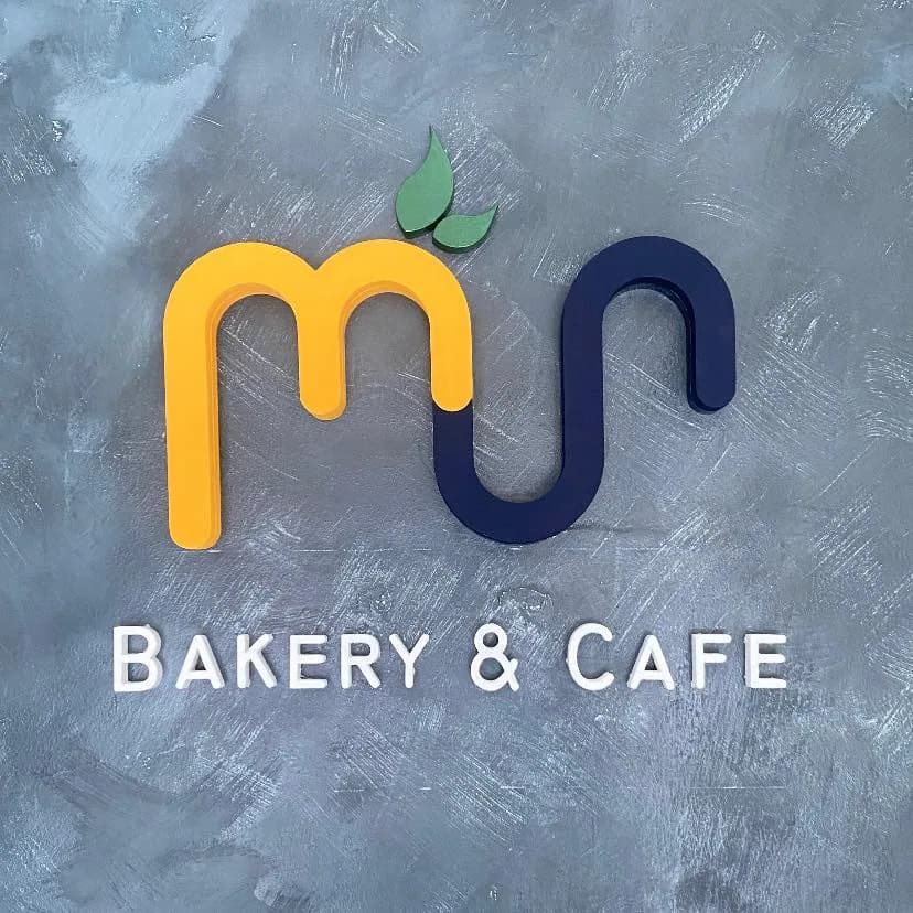 Mango Station Bakery and Cafe logo