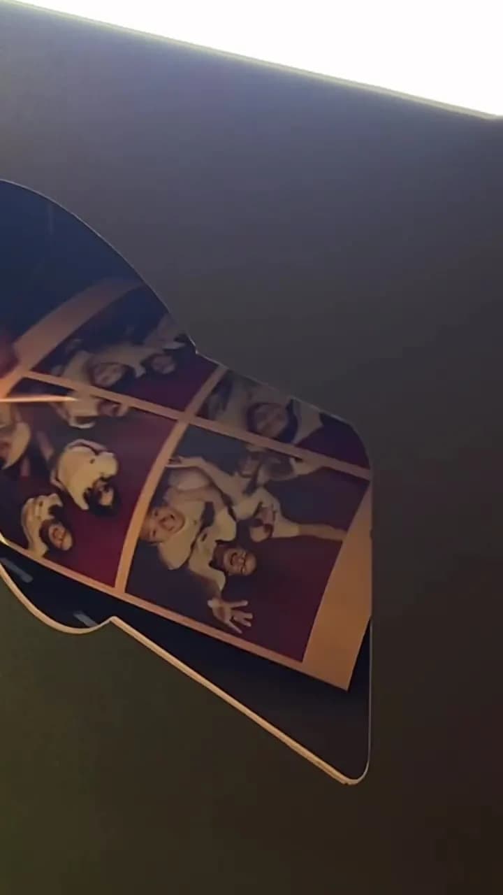High angle photo strip in a frame holder