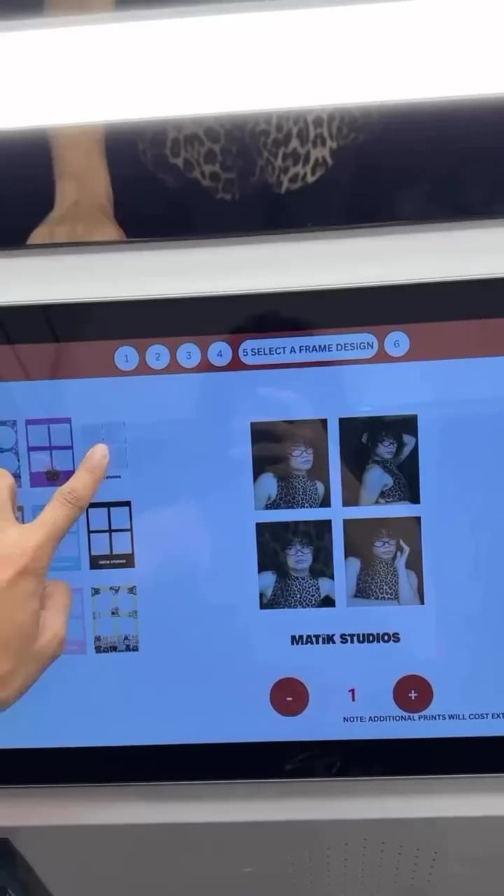 Customer choosing a frame on the Standard Angle photo booth