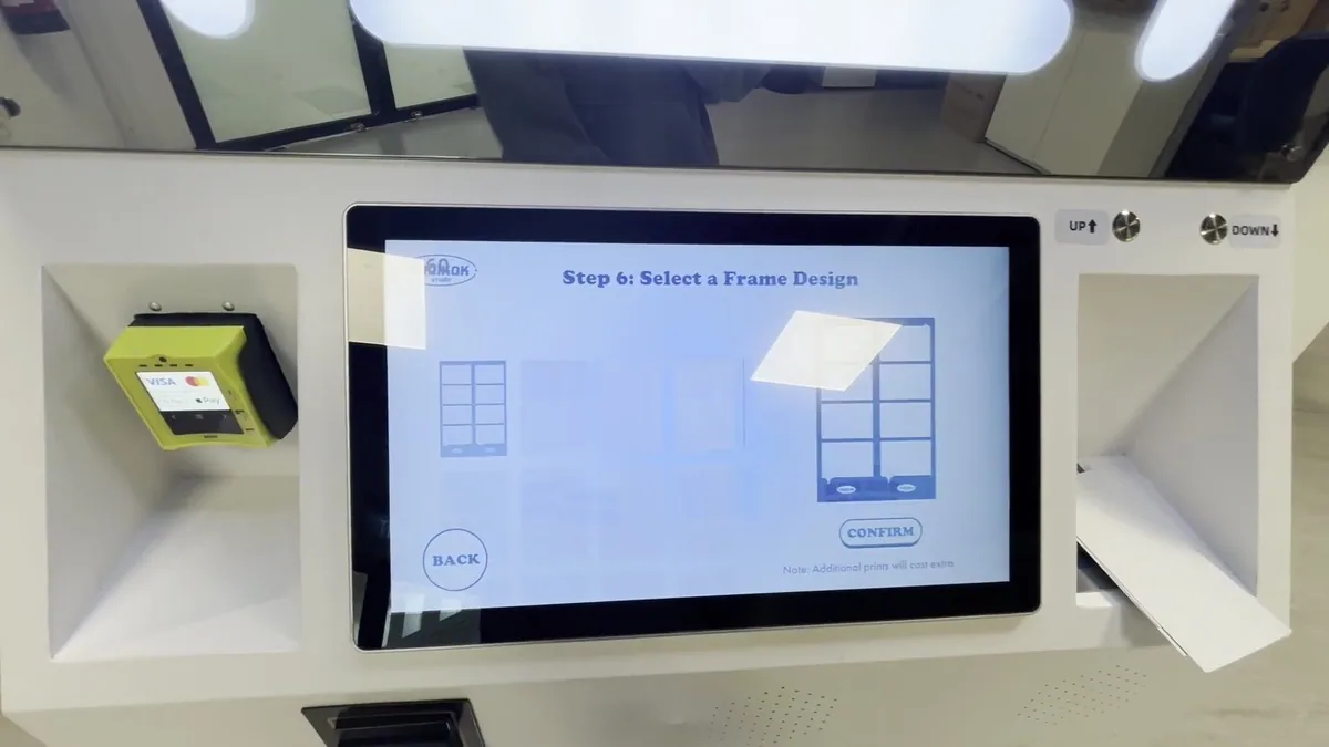 Frame design selection screen on a photo booth touchscreen
