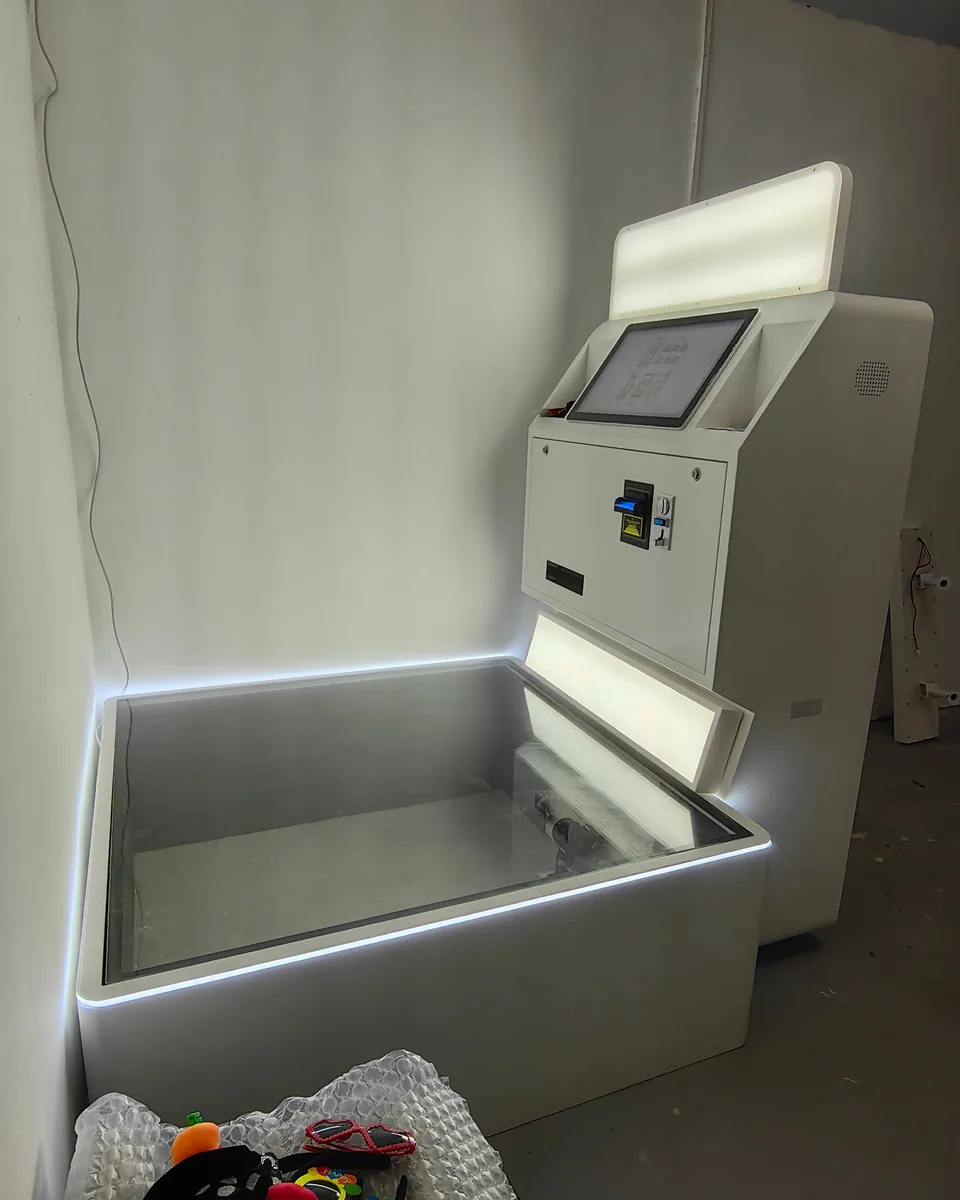 Low Angle photo booth with its lit floor platform and camera unit