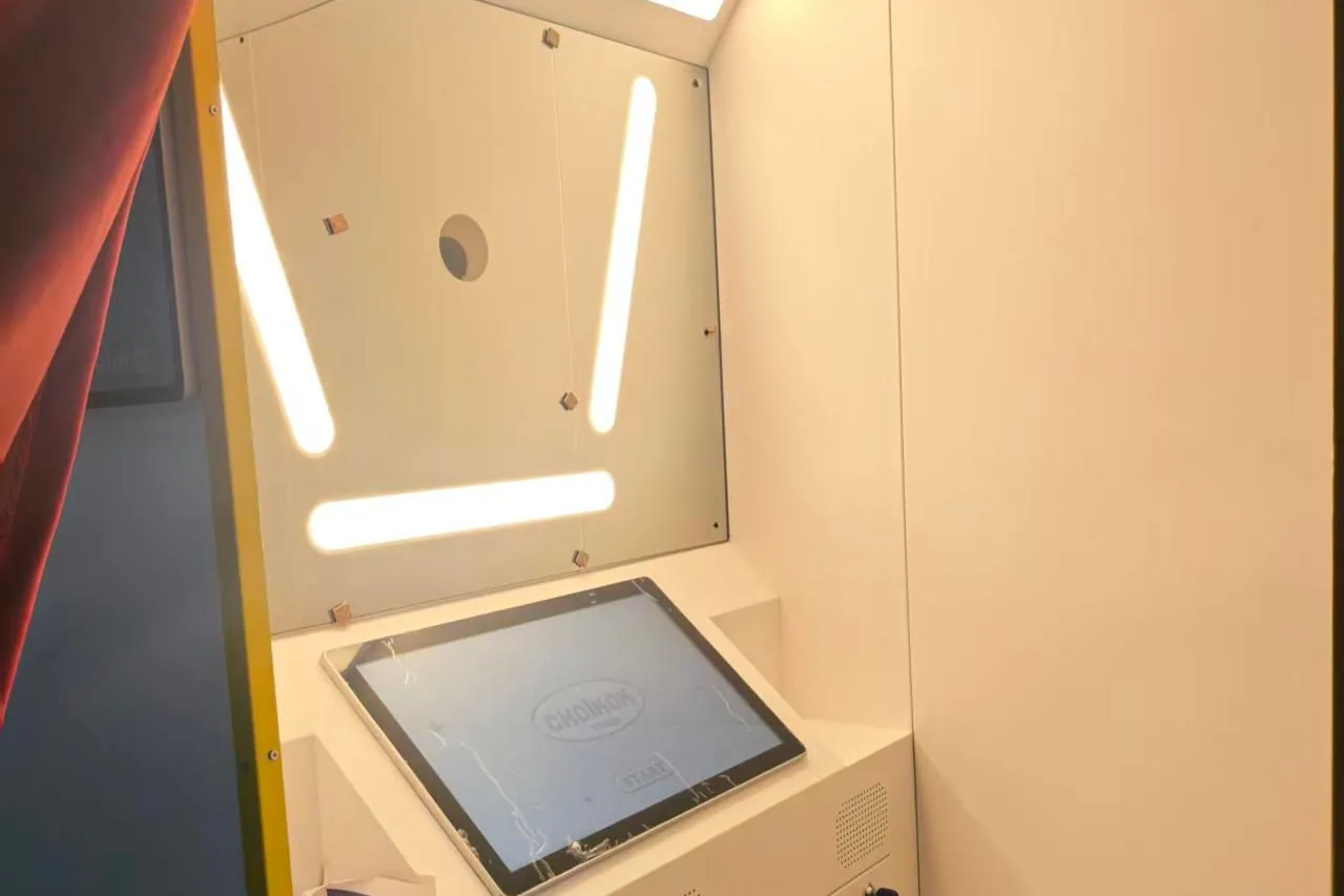 Inside a photo booth: touchscreen, camera, LED lights and card reader